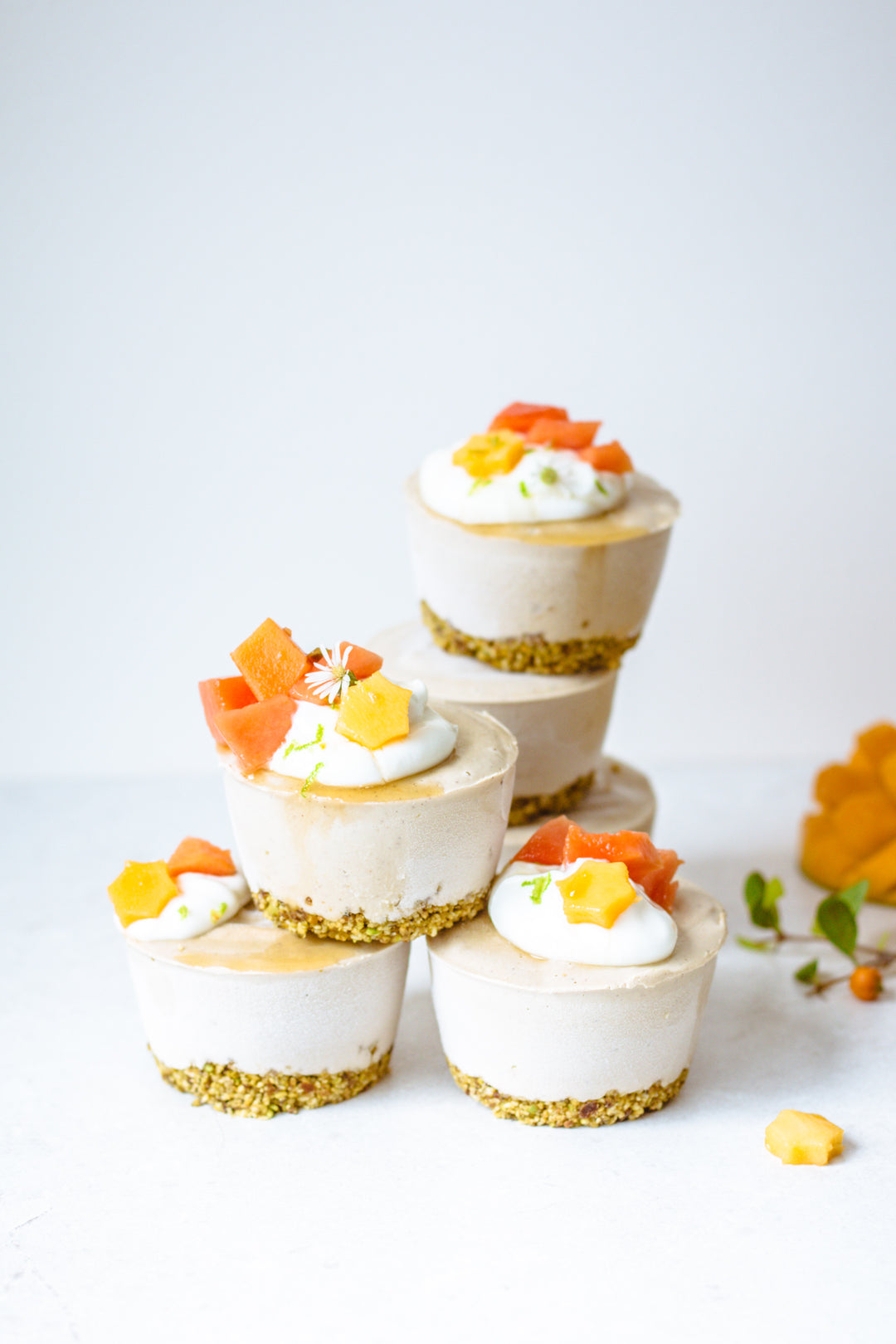 Mini Raw Mango Cheesecakes